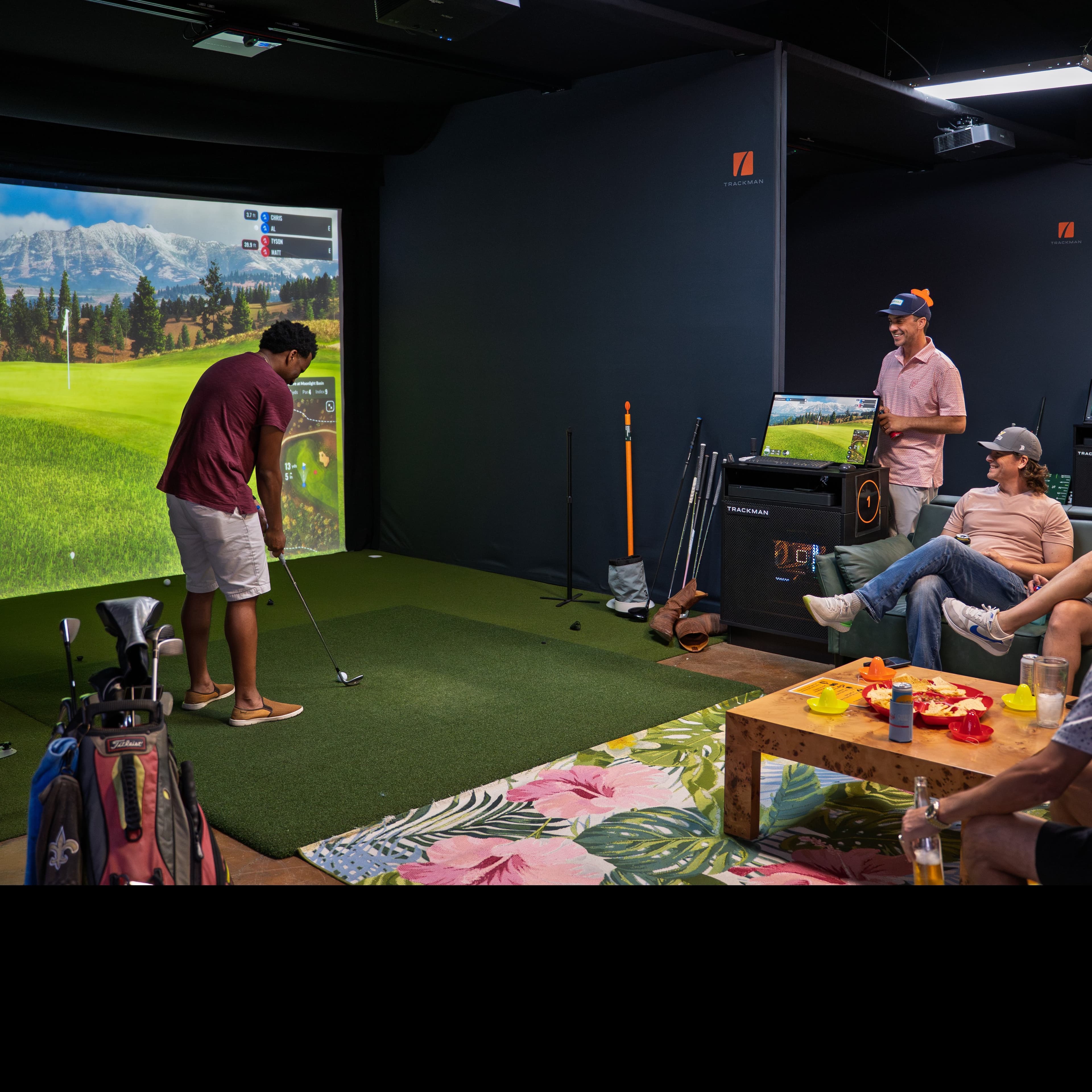 Indoor golf simulator bay at NeoGolf